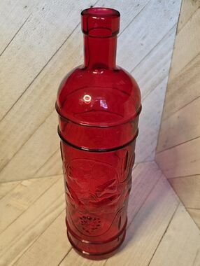 Red Glass Empty Wine Bottle With Grape And Leaf Pattern